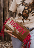 The Howdy Cowhide Clutch in Hot Pink