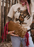 The Howdy Cowhide Clutch in Hot Pink