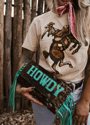 The Howdy Cowhide Clutch in Turquoise