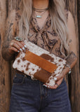 The Westward Cowhide Clutch
