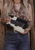 The Westward Cowhide Clutch