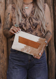 The Westward Cowhide Clutch