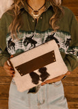 The Westward Cowhide Clutch