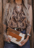 The Westward Cowhide Clutch