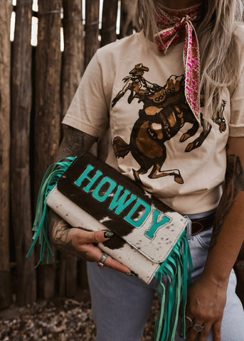 The Howdy Cowhide Clutch in Turquoise