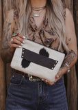 The Westward Cowhide Clutch