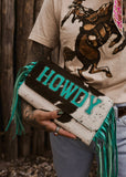 The Howdy Cowhide Clutch in Turquoise