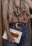 The Westward Cowhide Clutch