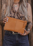The Westward Cowhide Clutch