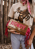 The Howdy Cowhide Clutch in Hot Pink