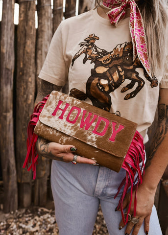 The Howdy Cowhide Clutch in Hot Pink