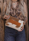 The Westward Cowhide Clutch