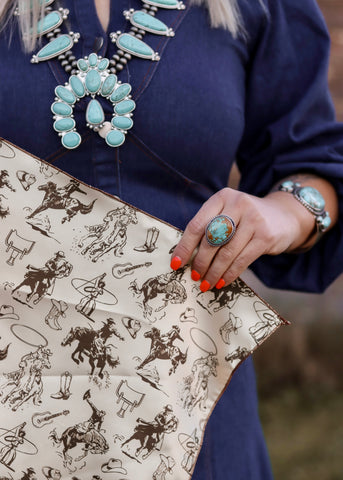 rodeo_western_fashion_silk_satin_turquoise_handmade_handcrafted_concho_scarfslide_slide_wildrag_wild_rag_neck_scarf_tie_necktie_floral_scarves_bucking_bronco_campdraft_barrel_racing_racer_linen_cutting_gingham_linen_8_seconds_ranch_life_cotton_western_toile_paisley_cowgirl_rodeo_poster_vintage_8_seconds_mack_and_co_designs_australia