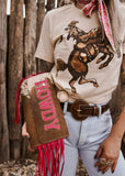 The Howdy Cowhide Clutch in Hot Pink