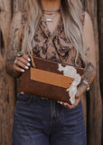 The Westward Cowhide Clutch
