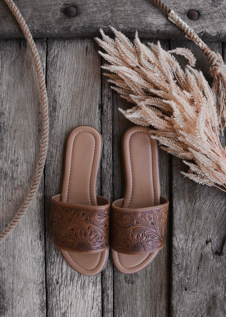 Tooled leather top slides
